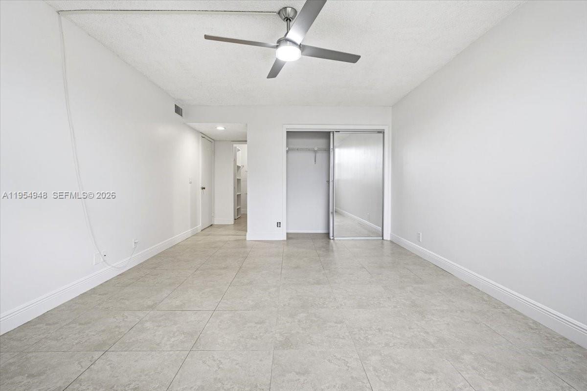 491 Racquet Club Road, Unit 107 Weston, FL 33326 - Photo 14 of 34 a view of an empty room