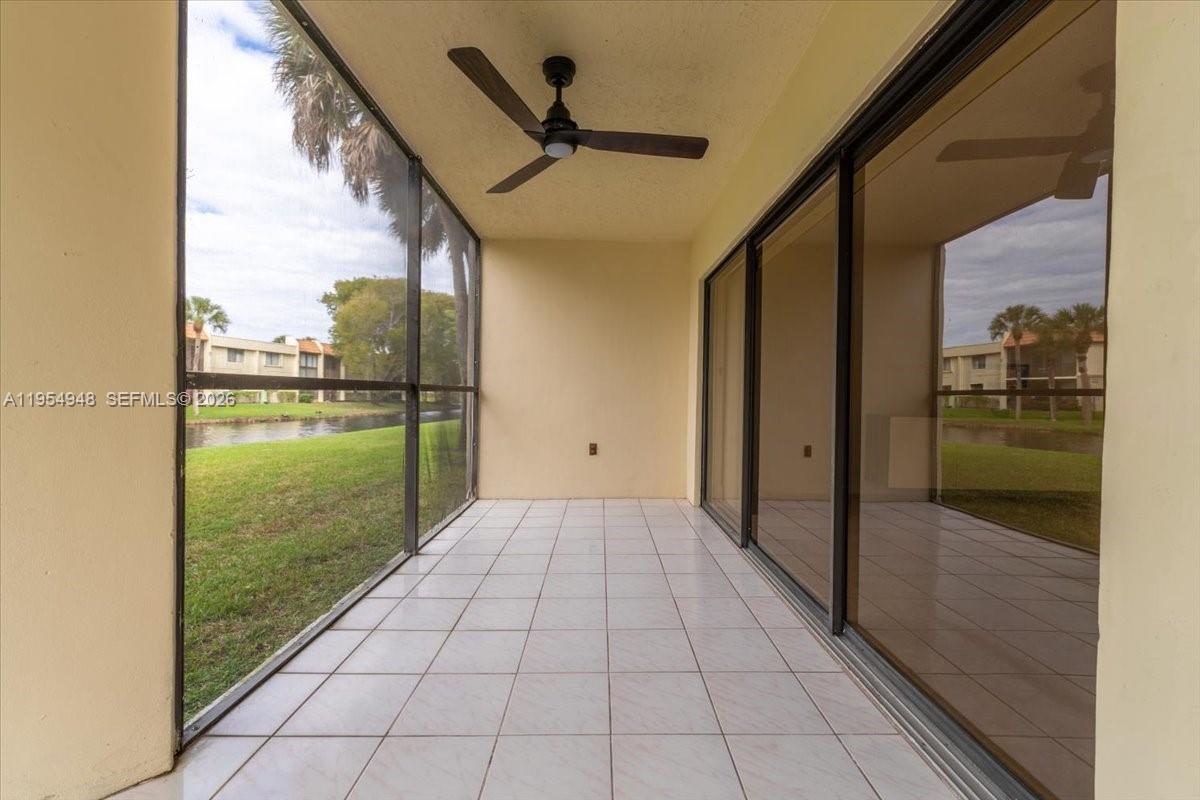 491 Racquet Club Road, Unit 107 Weston, FL 33326 - Photo 25 of 34 a view of a porch