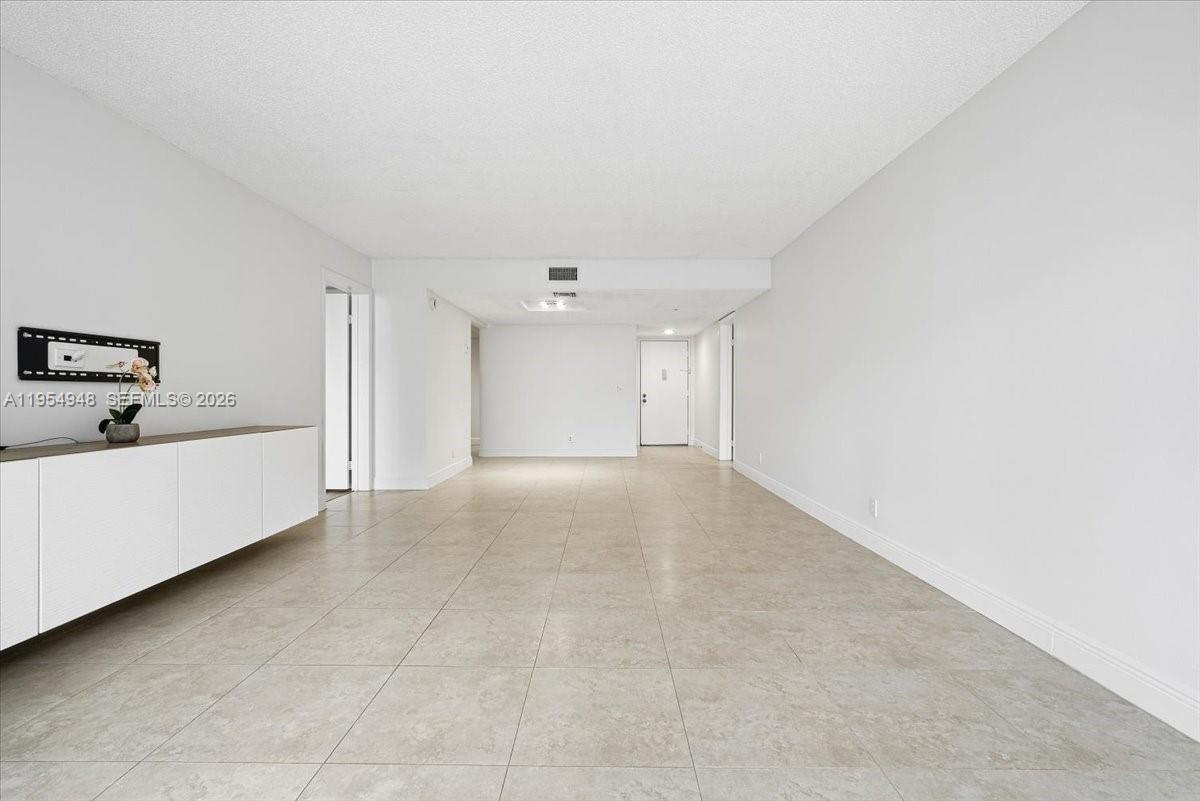 491 Racquet Club Road, Unit 107 Weston, FL 33326 - Photo 8 of 34 a view of an empty room