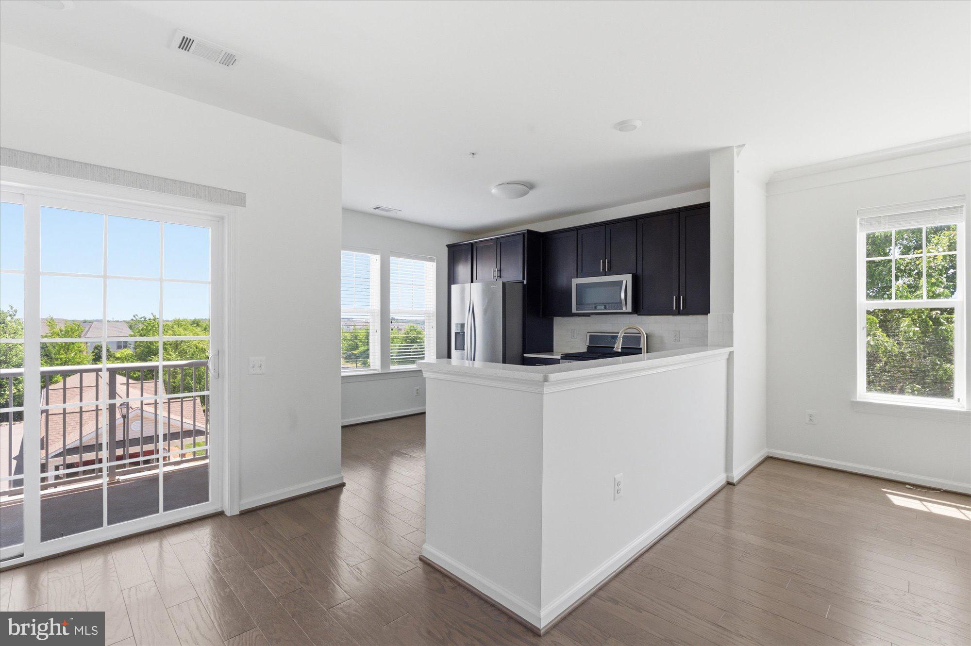 20650 Hope Spring Terrace, Unit 301 Ashburn, VA 20147 - Photo 19 of 35 Walk out to your private balcony