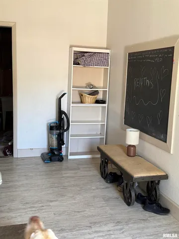 a room with furniture and a mirror