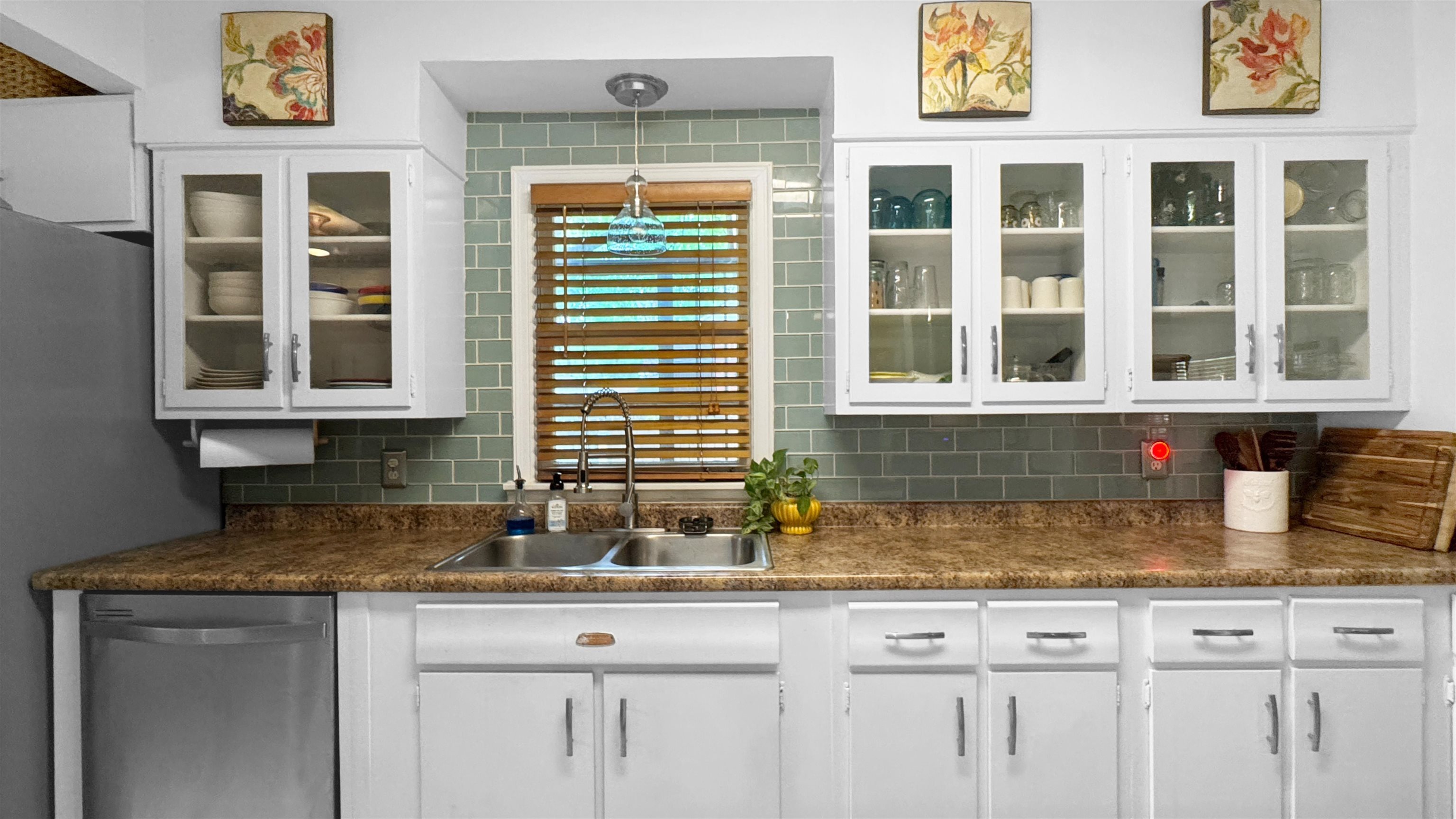 1269 Marcia Road Memphis, TN 38117 - Photo 8 of 27 a kitchen with granite countertop a sink and cabinets