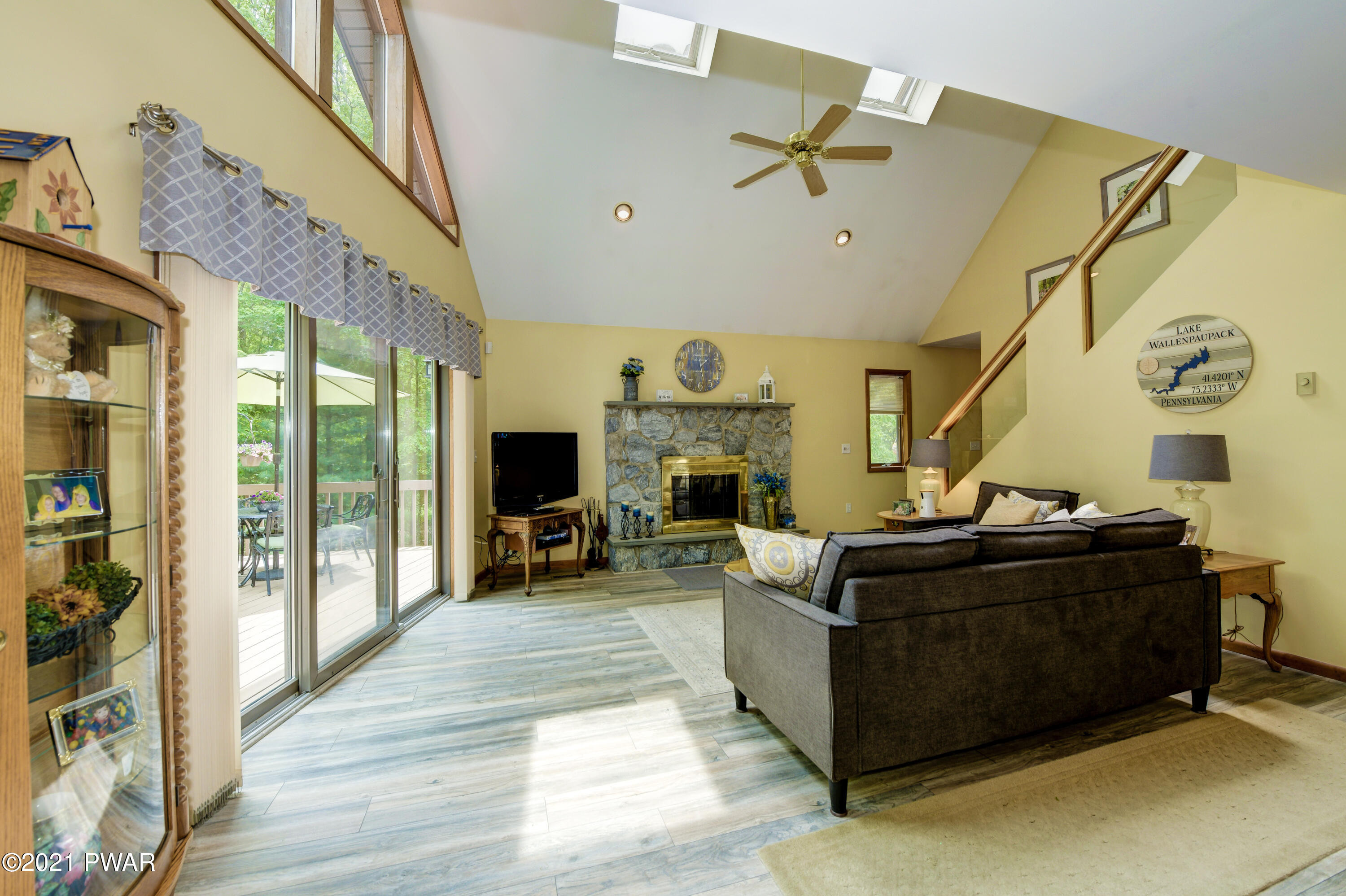 Living Room w/ Stone Fireplace