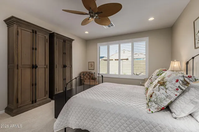 a view of swimming pool with outdoor seating