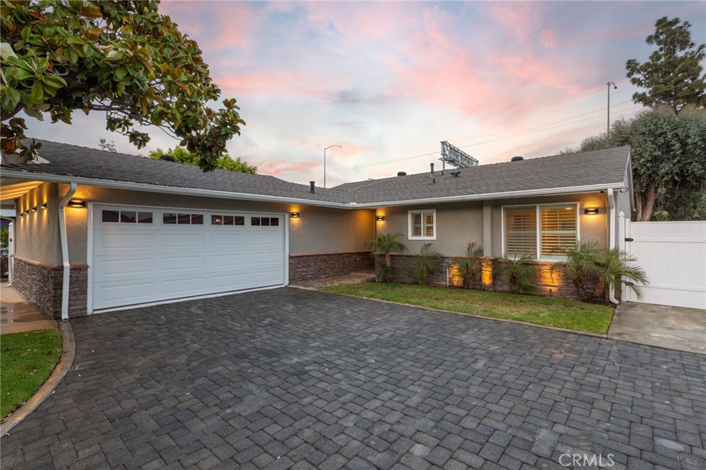 484 Traverse Drive Costa Mesa, CA 92626 - Photo 1 of 30 a view of a house with a yard and large tree