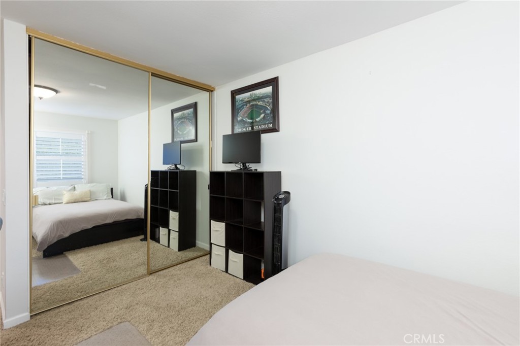 484 Traverse Drive Costa Mesa, CA 92626 - Photo 13 of 30 a bedroom with a bed and furniture