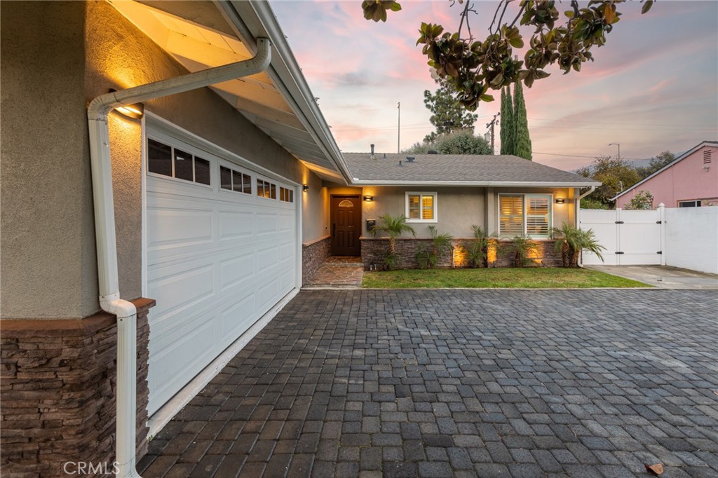 484 Traverse Drive Costa Mesa, CA 92626 - Photo 5 of 30 a front view of a house with garden