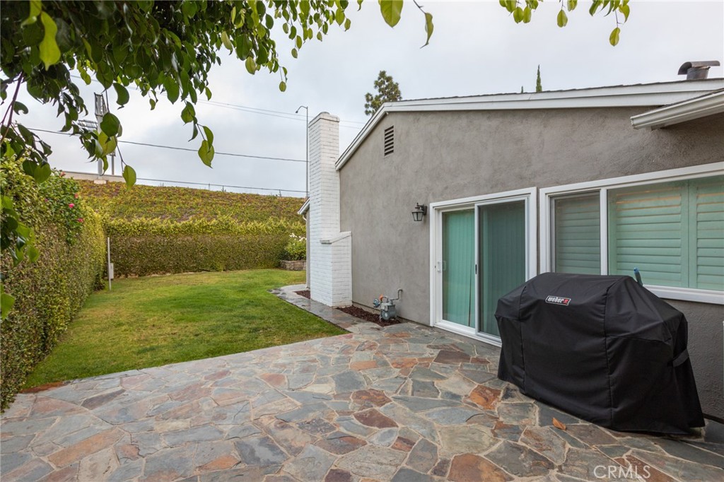 484 Traverse Drive Costa Mesa, CA 92626 - Photo 7 of 30 a balcony with table and chairs