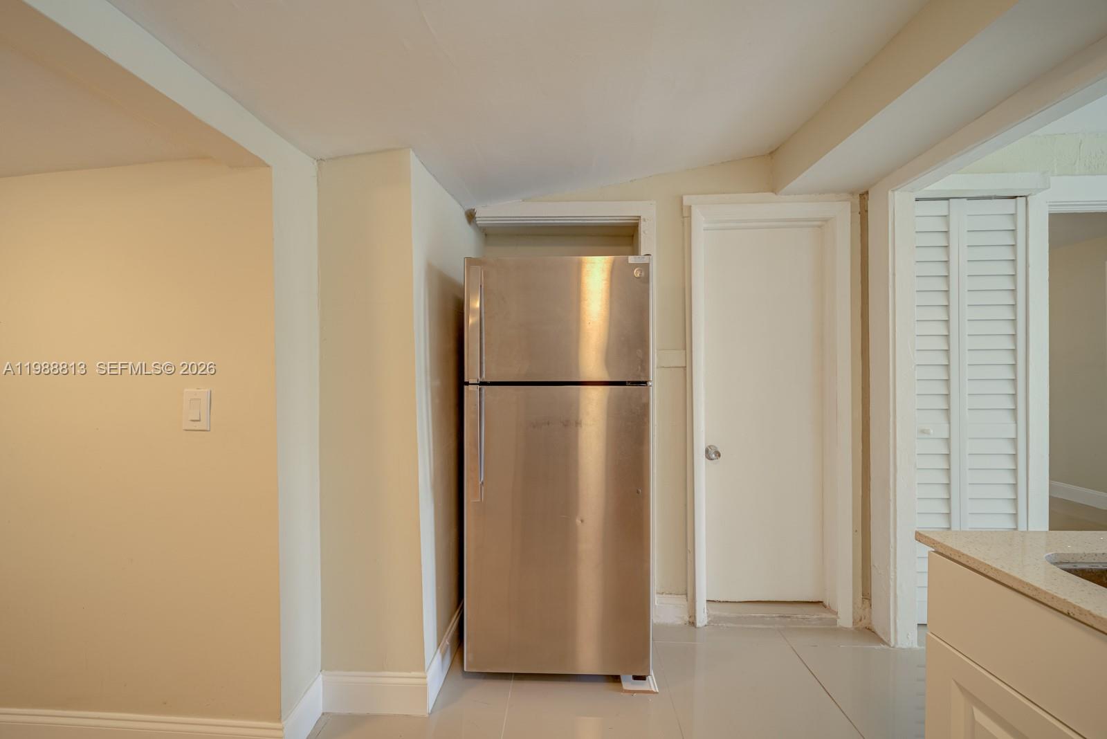 829 Northwest 56th Street Miami, FL 33127 - Photo 8 of 25 a view of a bathroom with a glass door