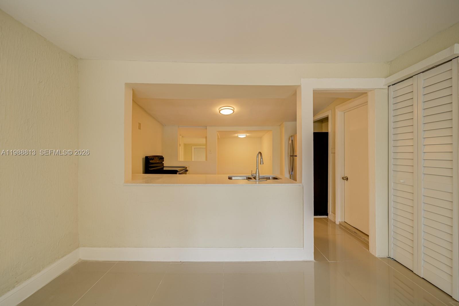829 Northwest 56th Street Miami, FL 33127 - Photo 10 of 25 a view of a bathtub in a room