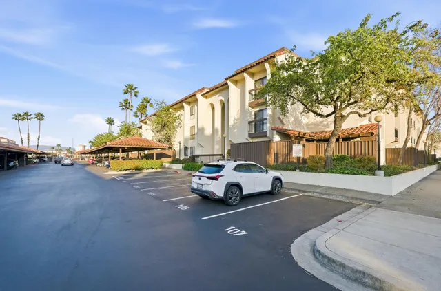a view of a street with cars