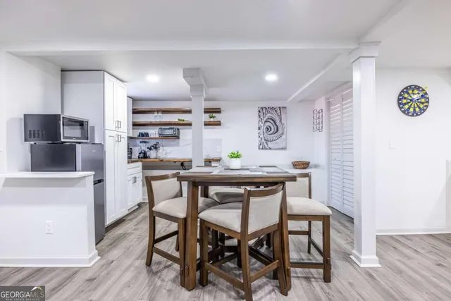a view of a dining room with furniture