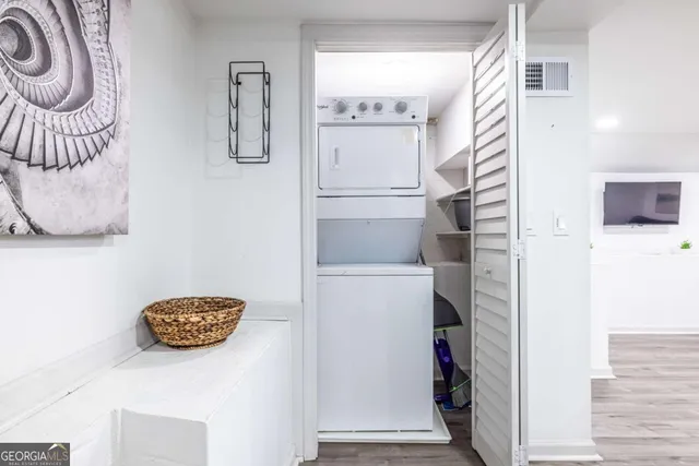 a front view of a building with parking space