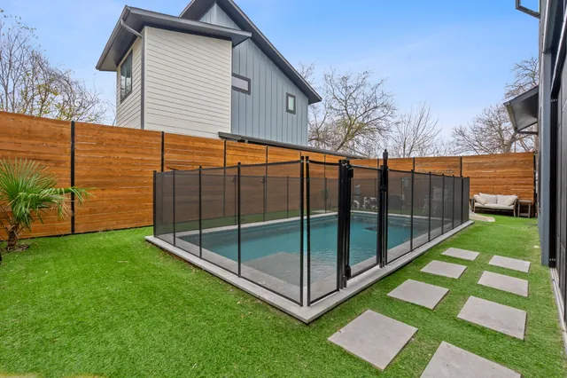 a view of a backyard with a garden