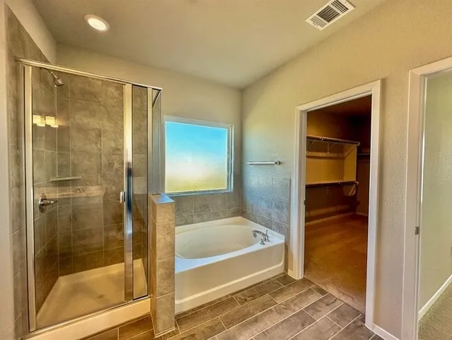 a storage room with wooden floor