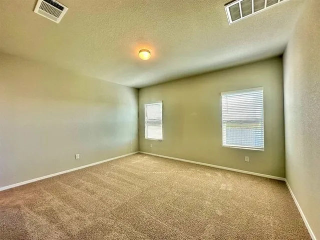 a bathroom with a bathtub and a sink