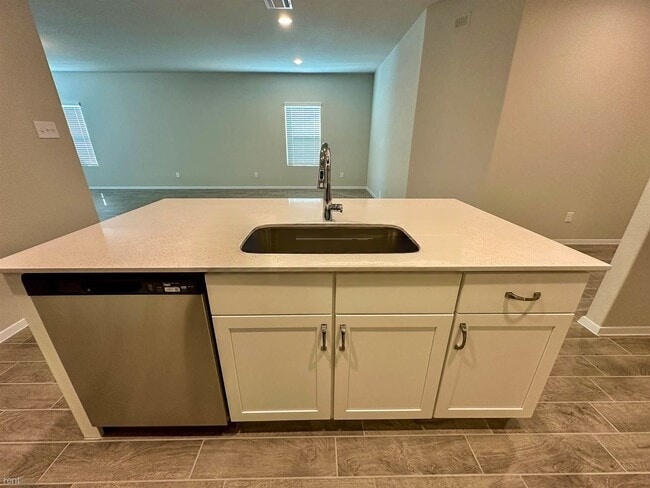 140 Keltic Drive Kyle, TX 78640 - Photo 14 of 20 a sink with a bench