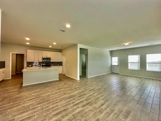 a view of city with tall buildings