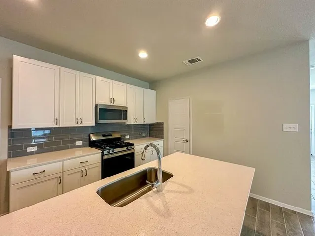 an empty room with a natural light