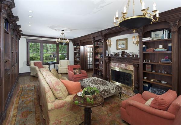 555 Concord Road Sudbury, MA 01776 - Photo 11 of 29 a living room with furniture a fireplace and a chandelier