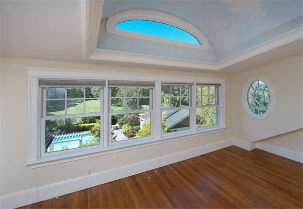 555 Concord Road Sudbury, MA 01776 - Photo 14 of 29 wooden floor in an empty room with a window