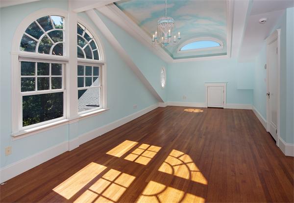 555 Concord Road Sudbury, MA 01776 - Photo 15 of 29 a view of an empty room with wooden floor and a window