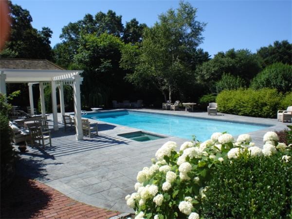 555 Concord Road Sudbury, MA 01776 - Photo 21 of 29 a view of a house with yard and sitting area