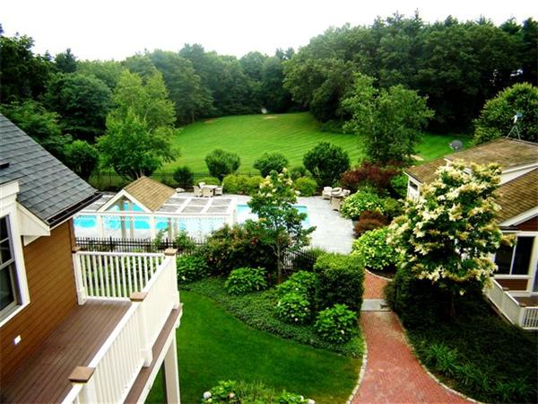 555 Concord Road Sudbury, MA 01776 - Photo 23 of 29 a view of a house with a yard