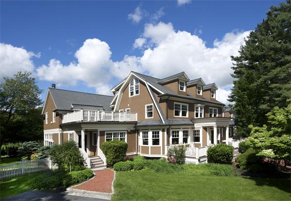 555 Concord Road Sudbury, MA 01776 - Photo 26 of 29 a front view of a house with a garden