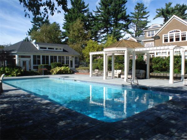 555 Concord Road Sudbury, MA 01776 - Photo 4 of 29 a front view of a house with a yard