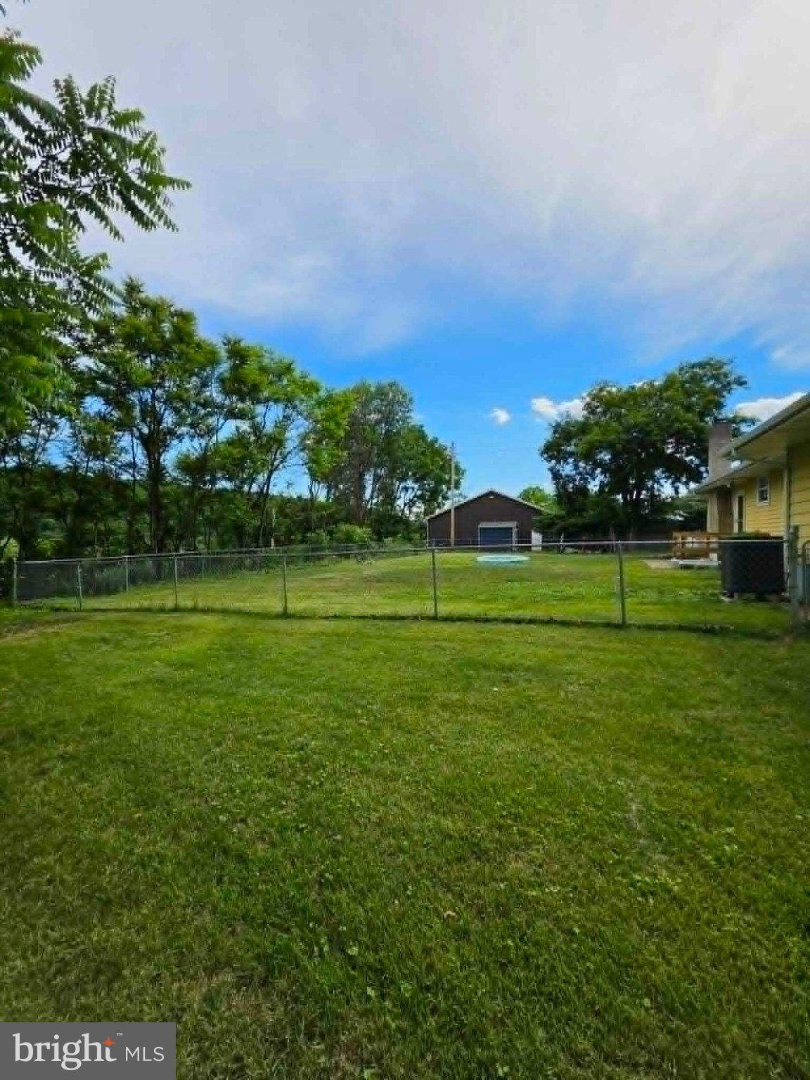 11275 Raystown Road Huntingdon, PA 16652 - Photo 19 of 29 Spacious fenced yard with lush greenery.
