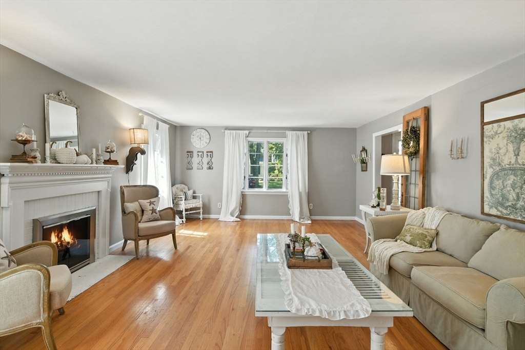 35 Plymouth Road Longmeadow, MA 01106 - Photo 1 of 41 a living room with furniture and a fireplace