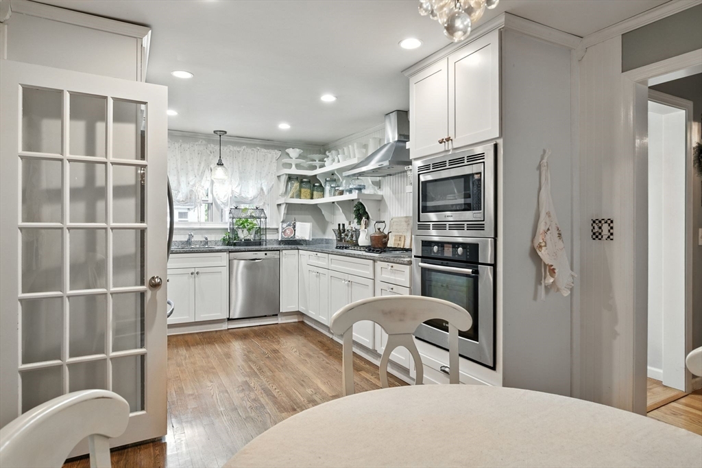 35 Plymouth Road Longmeadow, MA 01106 - Photo 15 of 41 a kitchen with stainless steel appliances granite countertop a refrigerator sink and cabinets