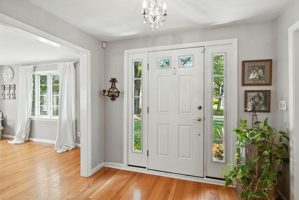 35 Plymouth Road Longmeadow, MA 01106 - Photo 2 of 41 wooden floor in an empty room with a window