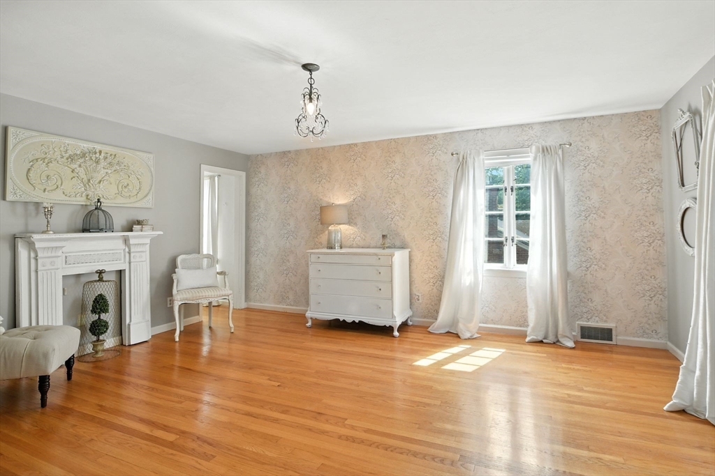35 Plymouth Road Longmeadow, MA 01106 - Photo 25 of 41 a living room with furniture and a fireplace