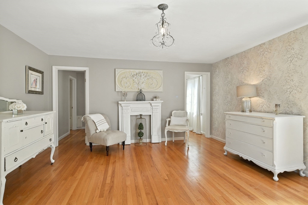 35 Plymouth Road Longmeadow, MA 01106 - Photo 26 of 41 a living room with furniture and a fireplace