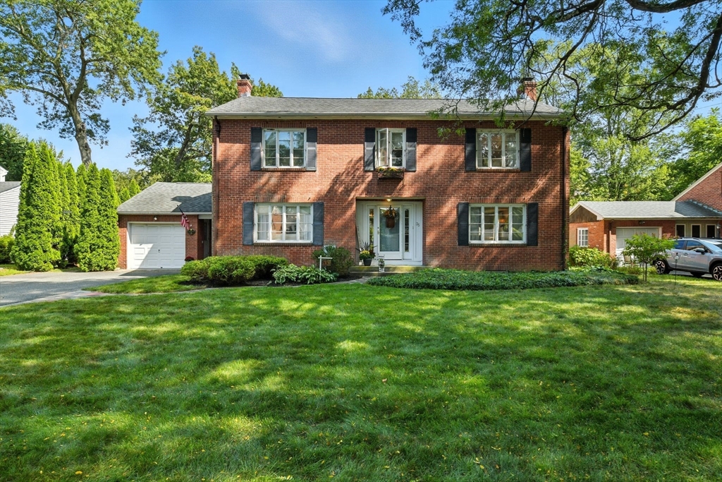 35 Plymouth Road Longmeadow, MA 01106 - Photo 35 of 41 a front view of a house with a yard