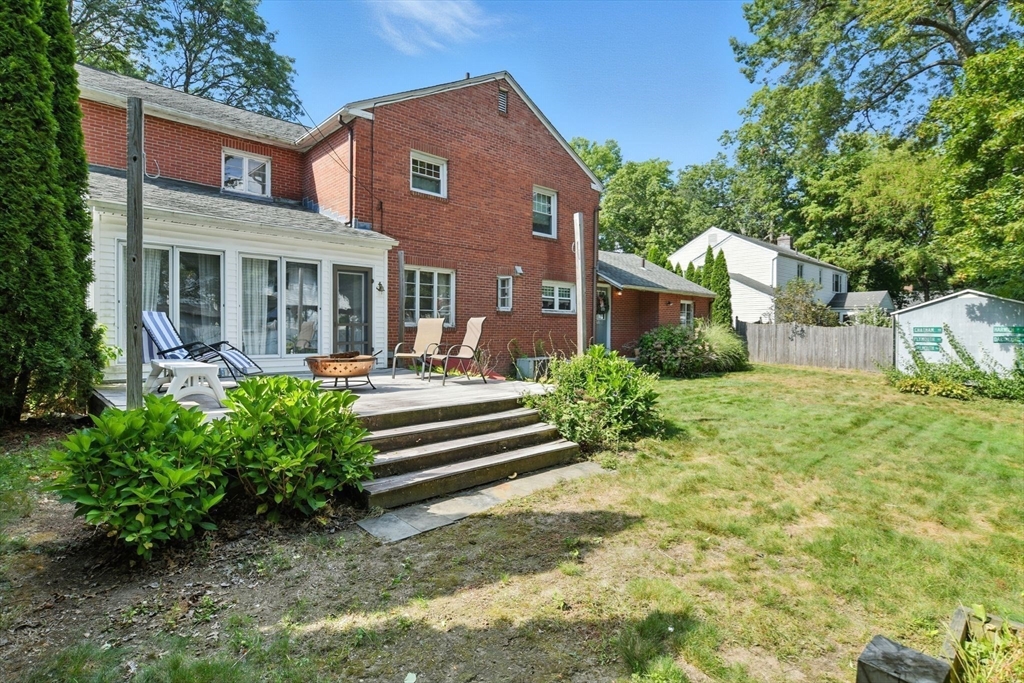 35 Plymouth Road Longmeadow, MA 01106 - Photo 41 of 41 a front view of a house with a yard table and chairs
