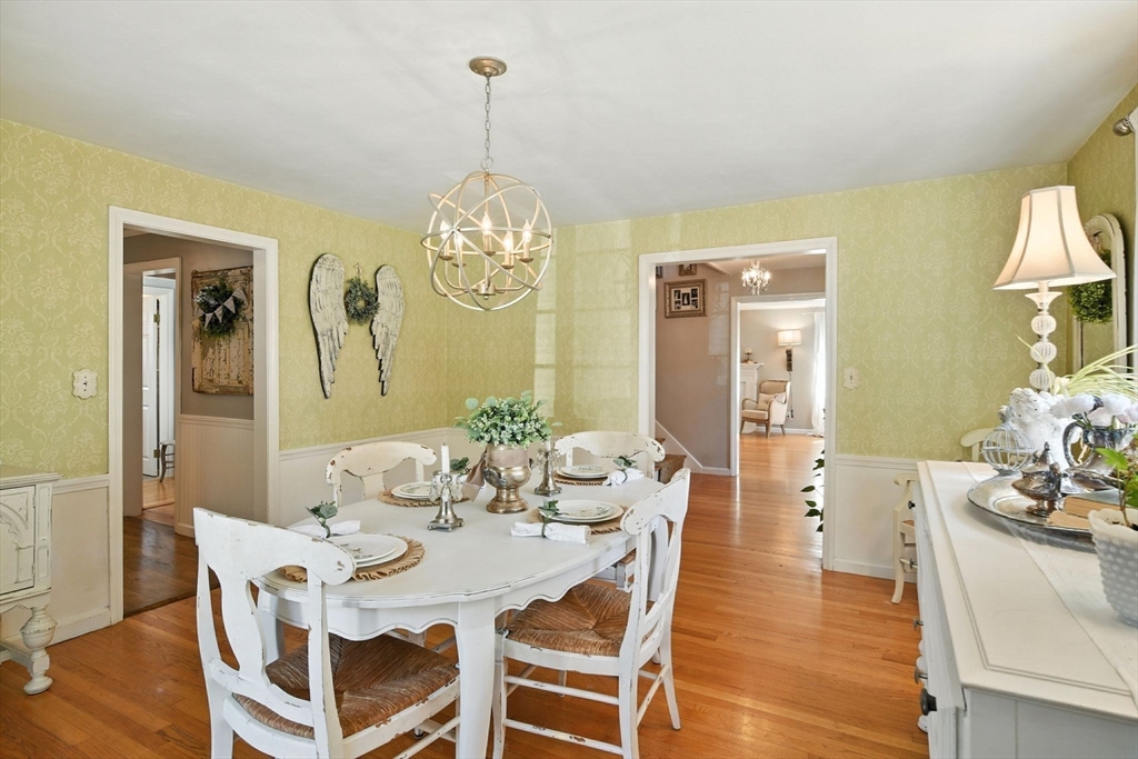 35 Plymouth Road Longmeadow, MA 01106 - Photo 6 of 41 a view of a dining room with furniture a chandelier and wooden floor
