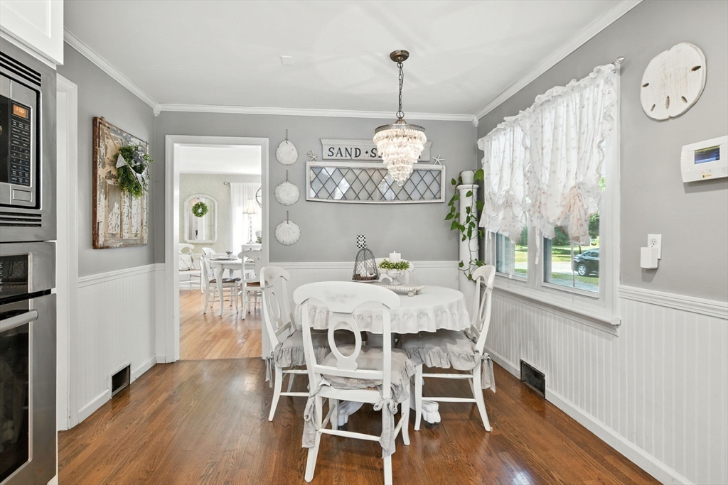 35 Plymouth Road Longmeadow, MA 01106 - Photo 9 of 41 a view of a dining room with furniture window and wooden floor