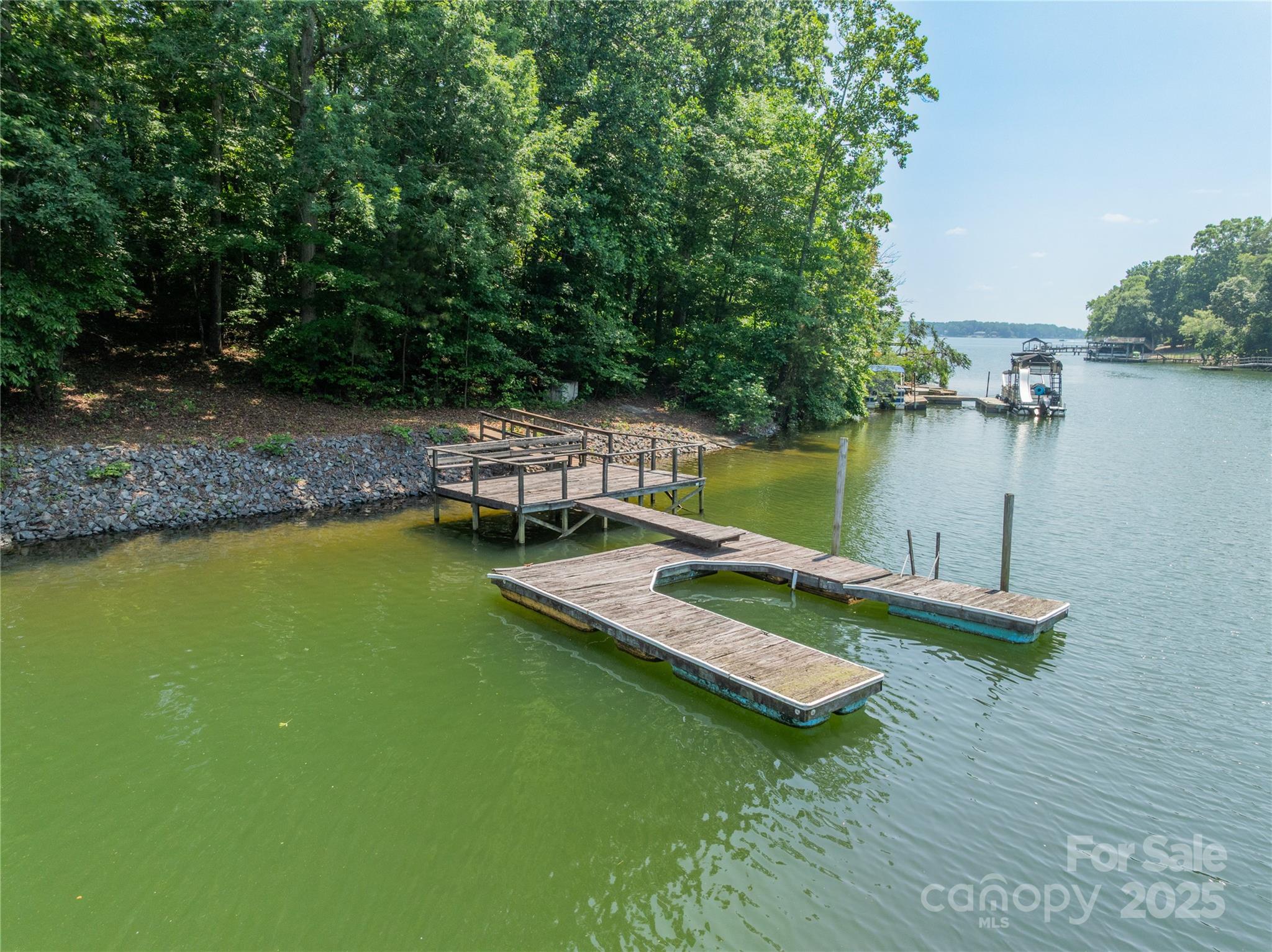 200 Greenbay Road Mooresville, NC 28117 - Photo 7 of 11 a view of a swimming pool with a lake view