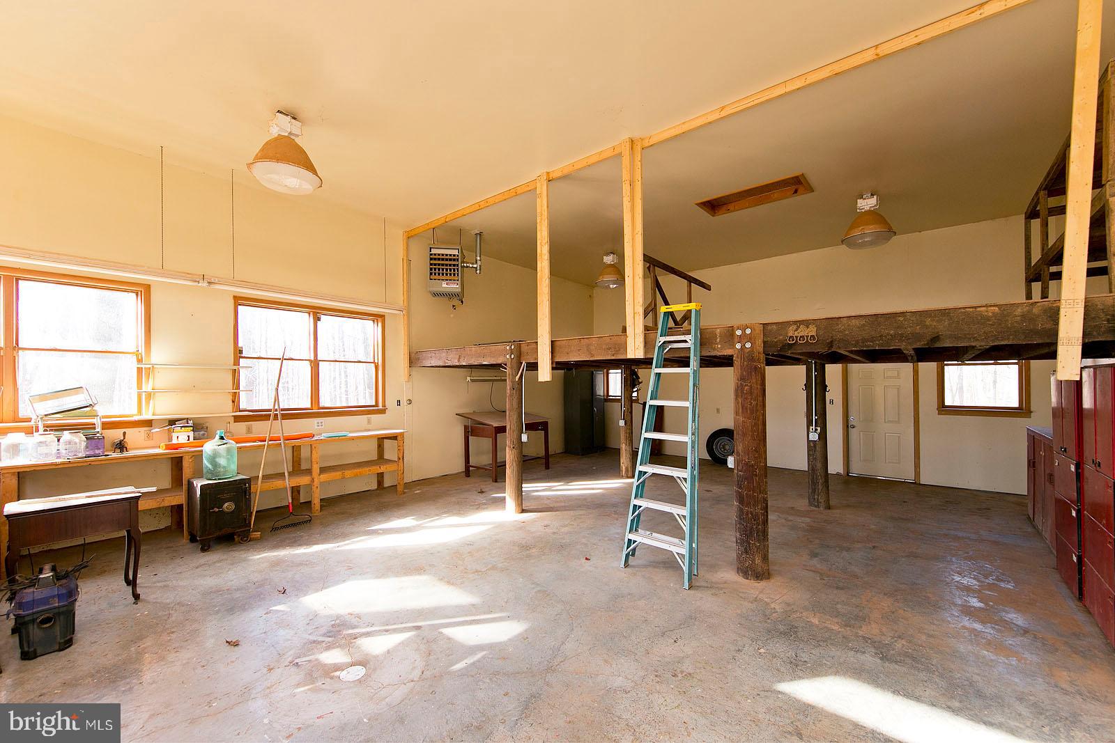 3680 Green Spring Road Winchester, VA 22603 - Photo 37 of 41 Work shop with built ins, storage area,.