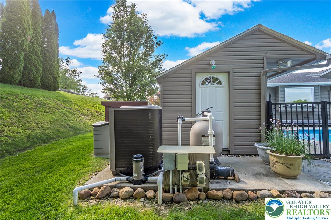 540 Briar Road Pen Argyl, PA 18072 - Photo 47 of 66 A well-maintained side yard features inground pool equipment