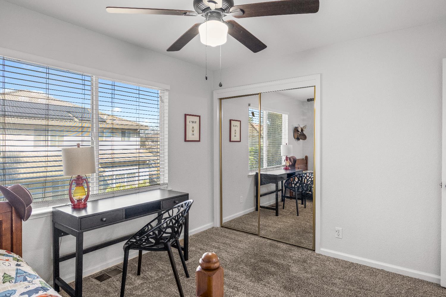 637 Rebekah Court Ripon, CA 95366 - Photo 42 of 69 a view of a dining room with furniture and a window