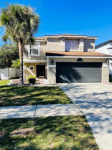 a front view of house with yard