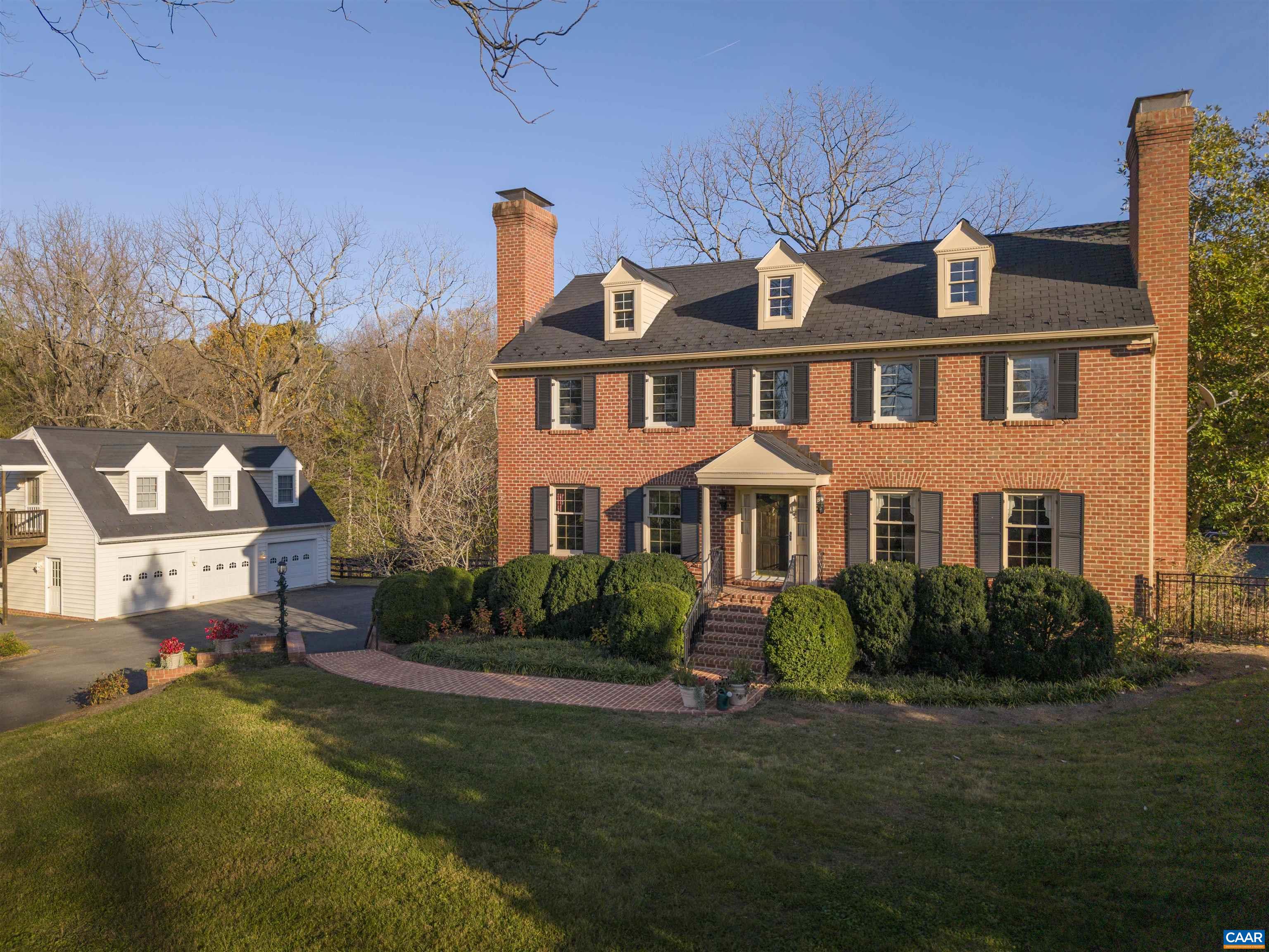 1789 Stony Point Road Charlottesville, VA 22911 - Photo 1 of 46 a front view of a house with garden