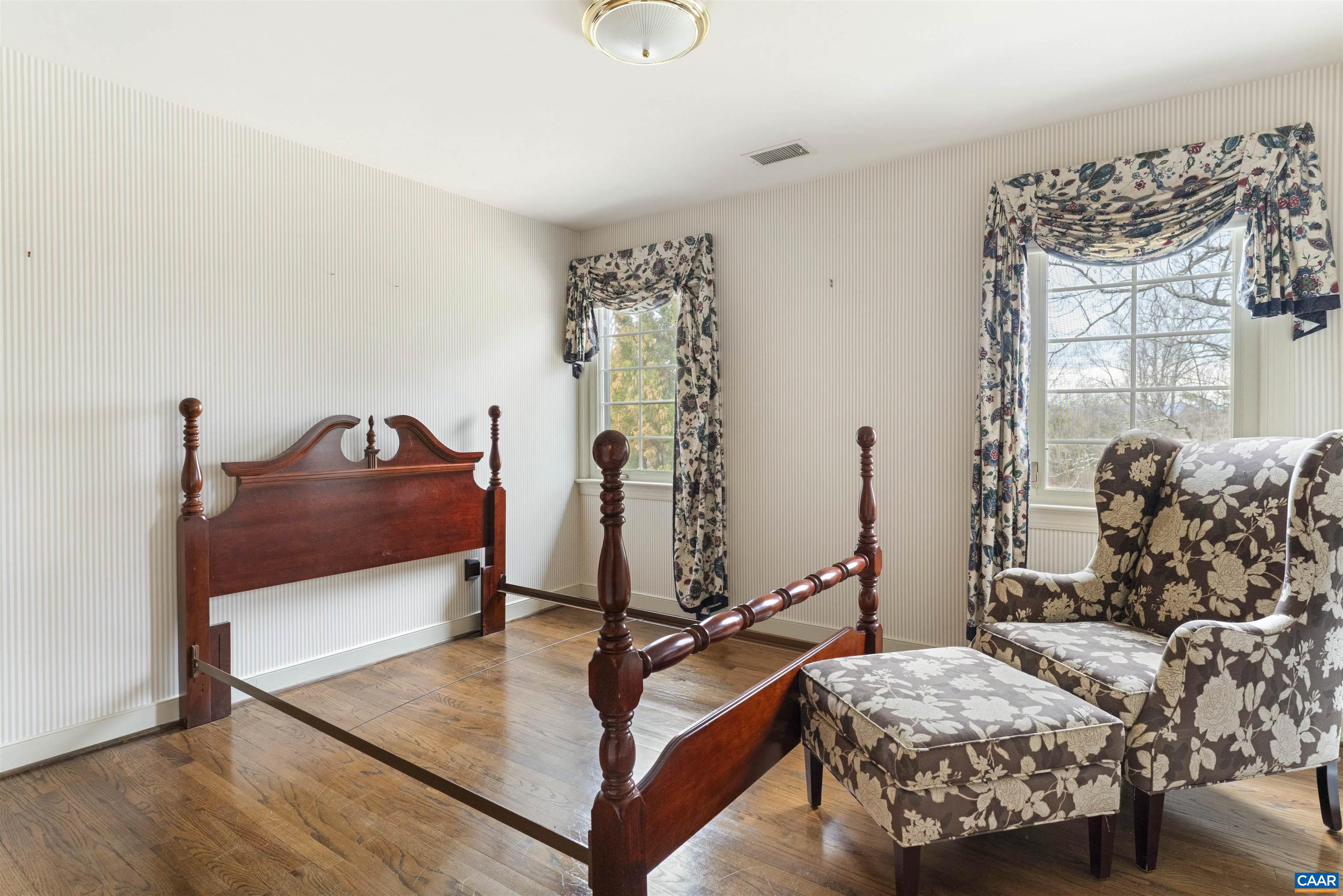 1789 Stony Point Road Charlottesville, VA 22911 - Photo 17 of 46 a bedroom with furniture and a bed