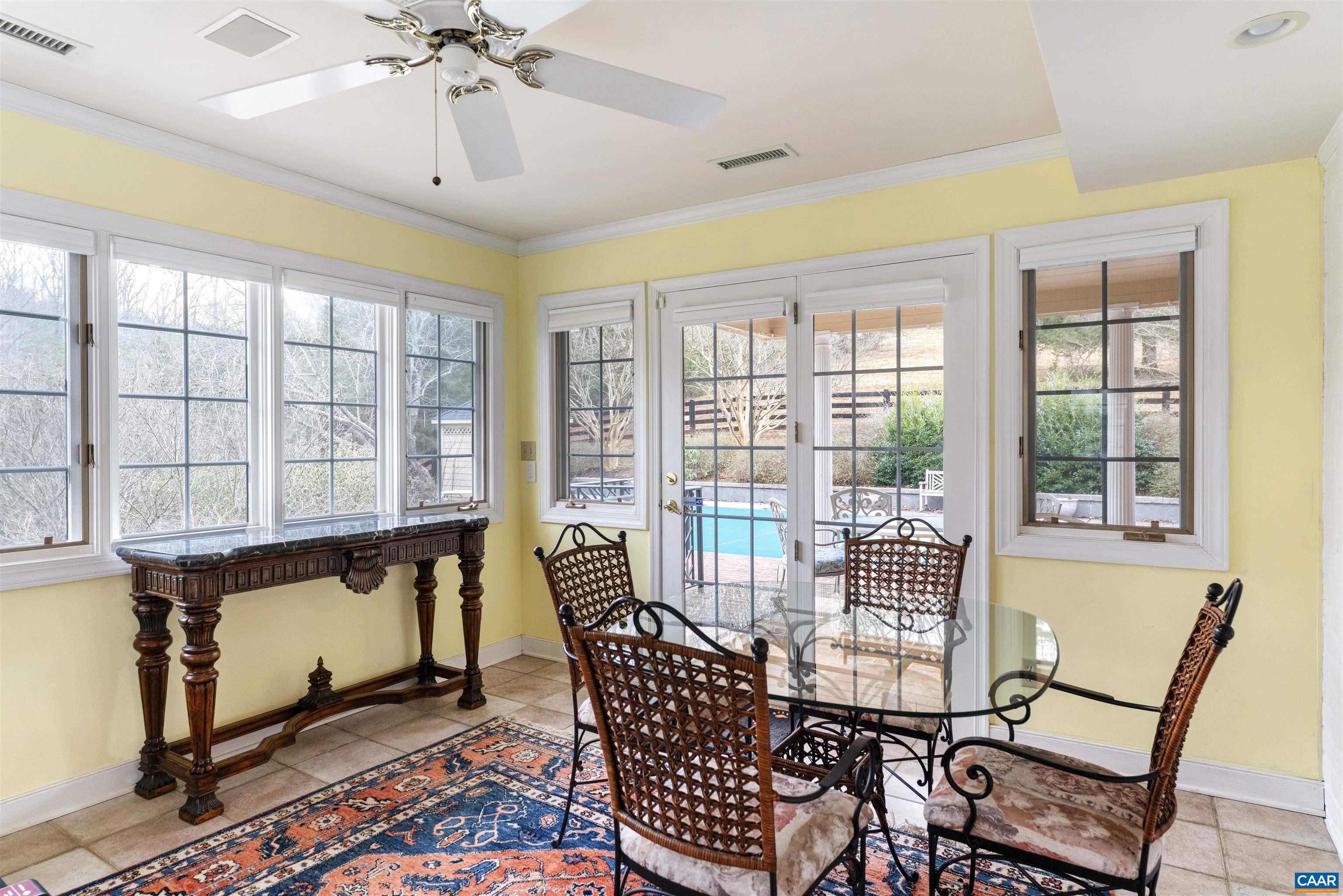 1789 Stony Point Road Charlottesville, VA 22911 - Photo 9 of 46 a dining room with furniture a chandelier and wooden floor