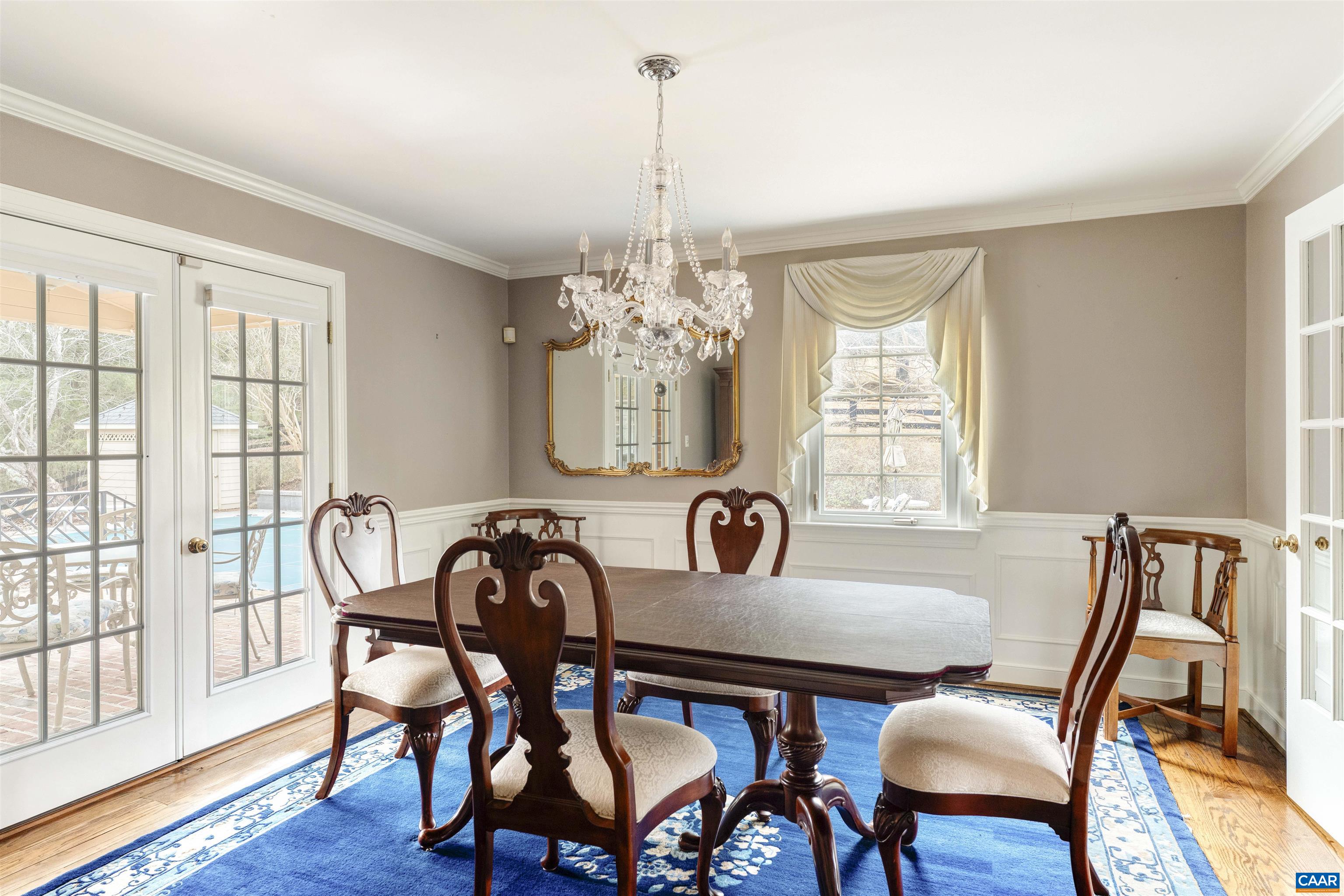 1789 Stony Point Road Charlottesville, VA 22911 - Photo 10 of 46 a view of a dining room with furniture window and wooden floor