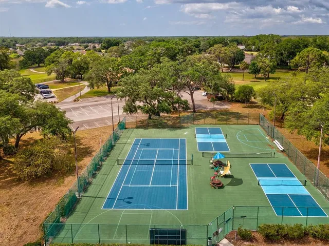 an aerial view of a house with swimming pool